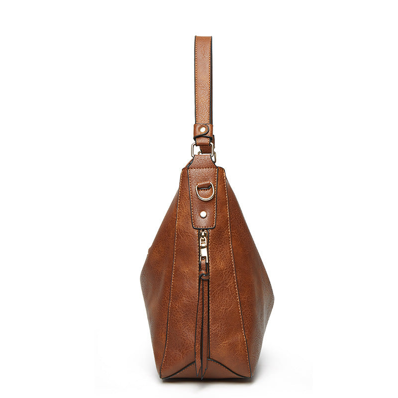 Bolso bandolera – Elegancia urbana en color marrón