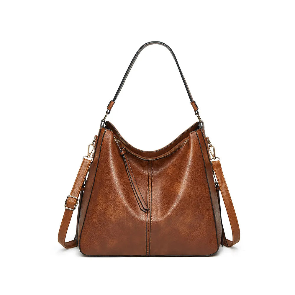Bolso bandolera – Elegancia urbana en color marrón